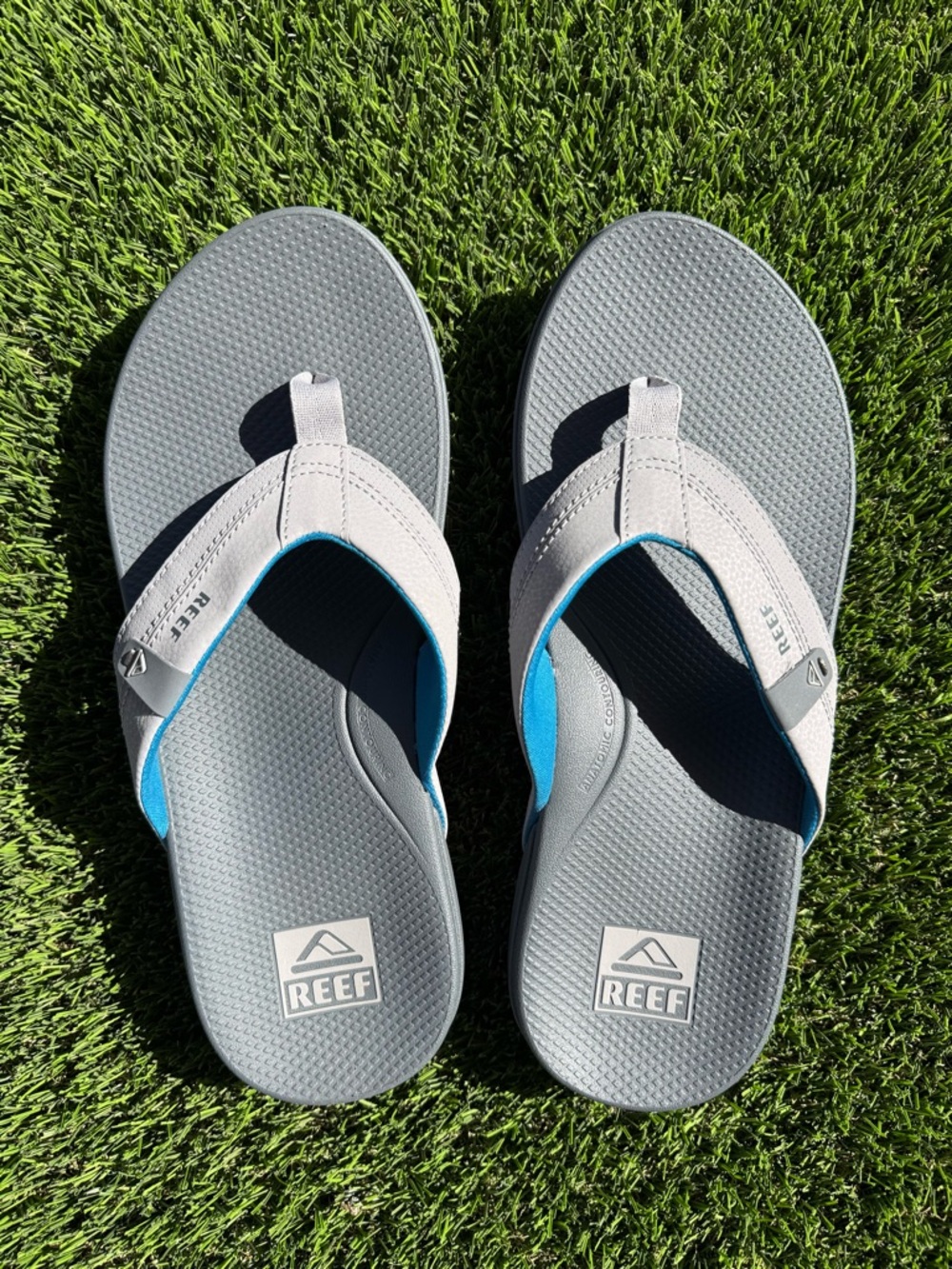 Reef Men’s Gray Flip-Flops with Light Blue Accents